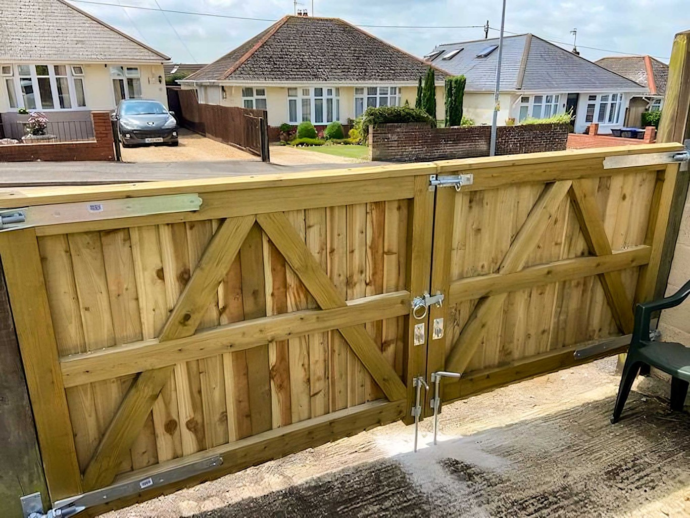Large double gate with various fixtures and fittings.