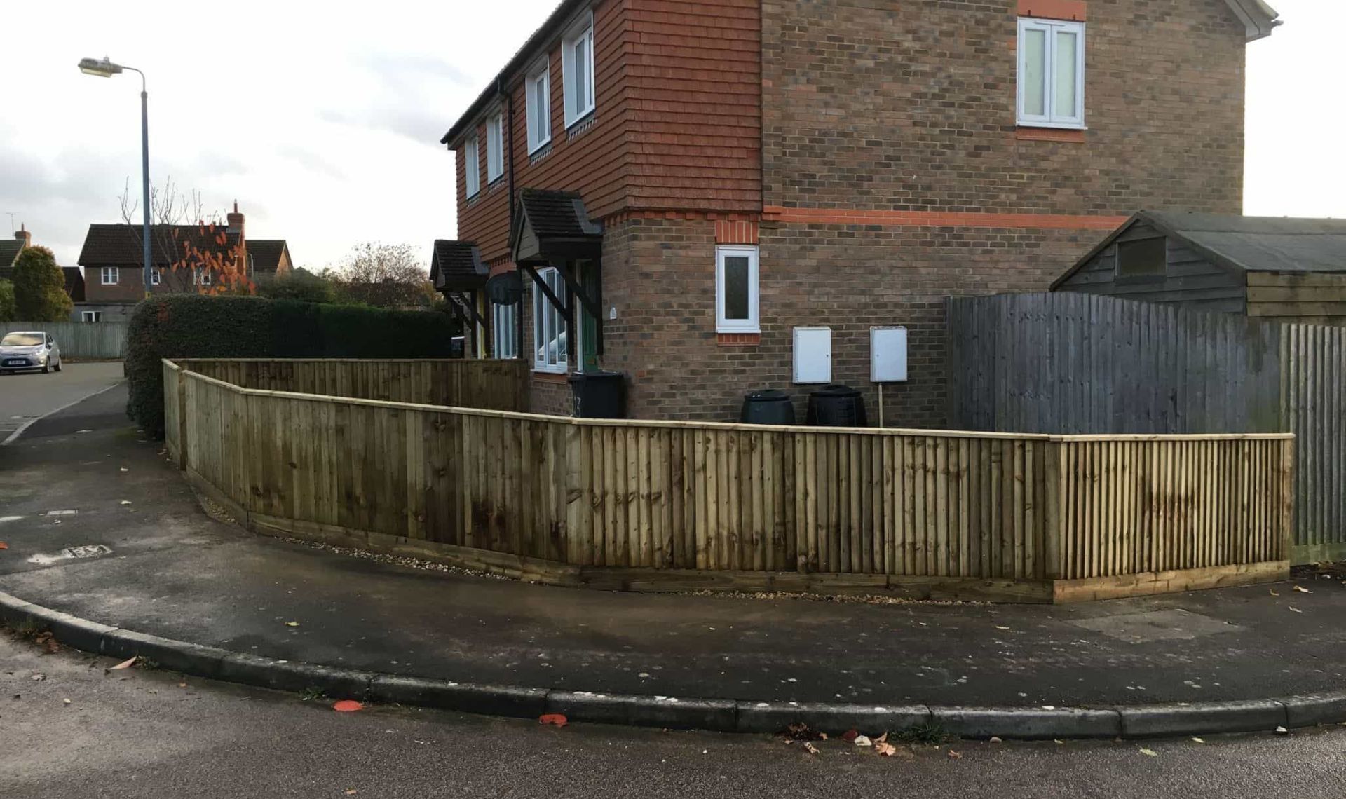 Closeboard fence in amesbury completed around a corner house.